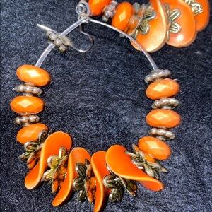 Bold Orange Floral Hoop Earrings from the 80’s